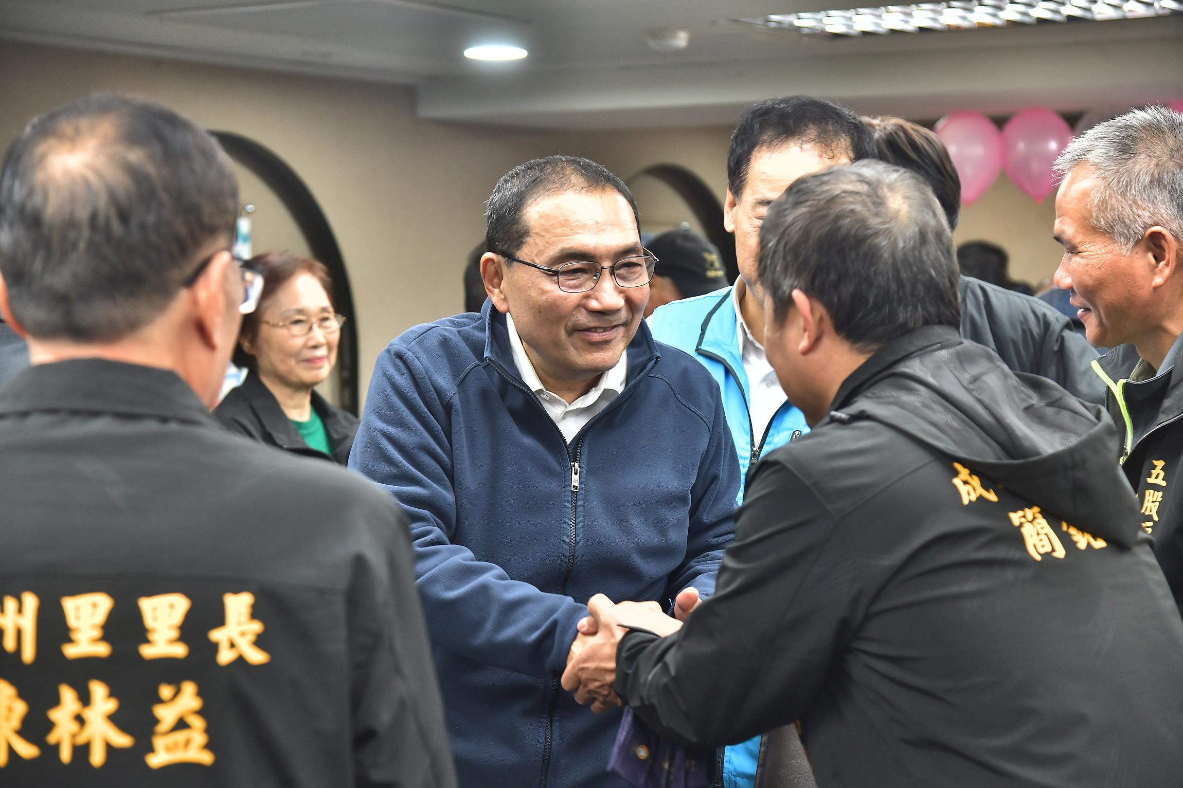 繼續與里長並肩合作，讓新北市更繁榮