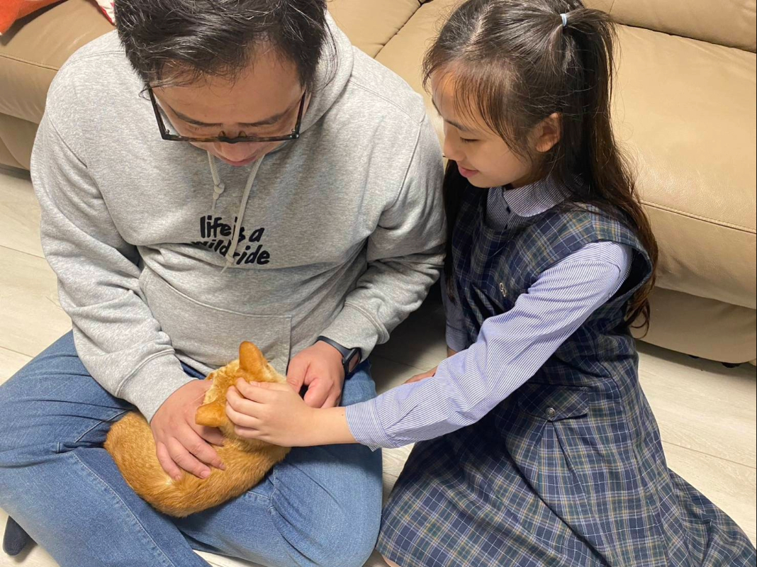  飼主與認養毛寶貝的幸福合影