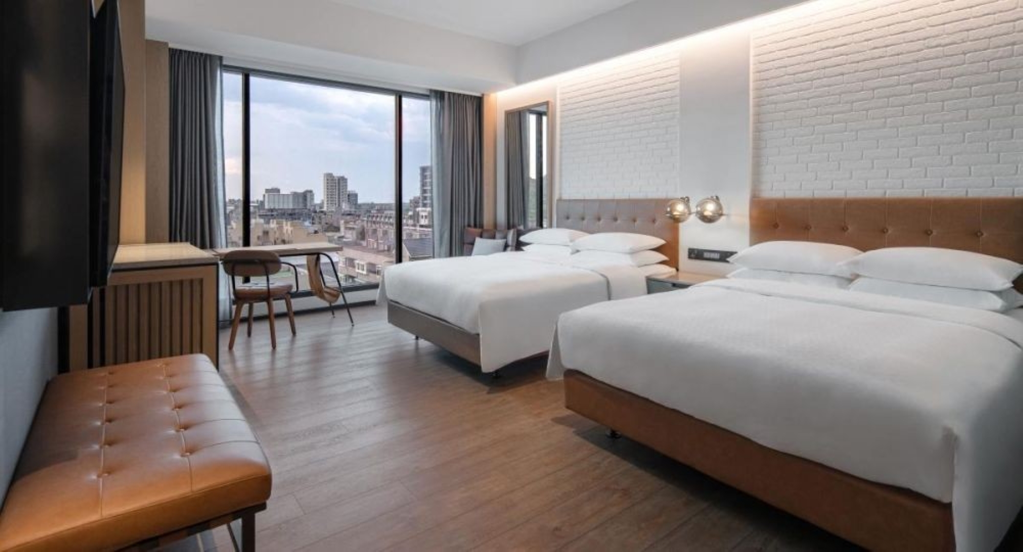 冠軍獨得「八里福朋喜來登酒店」雅致客房雙人住宿券2張。