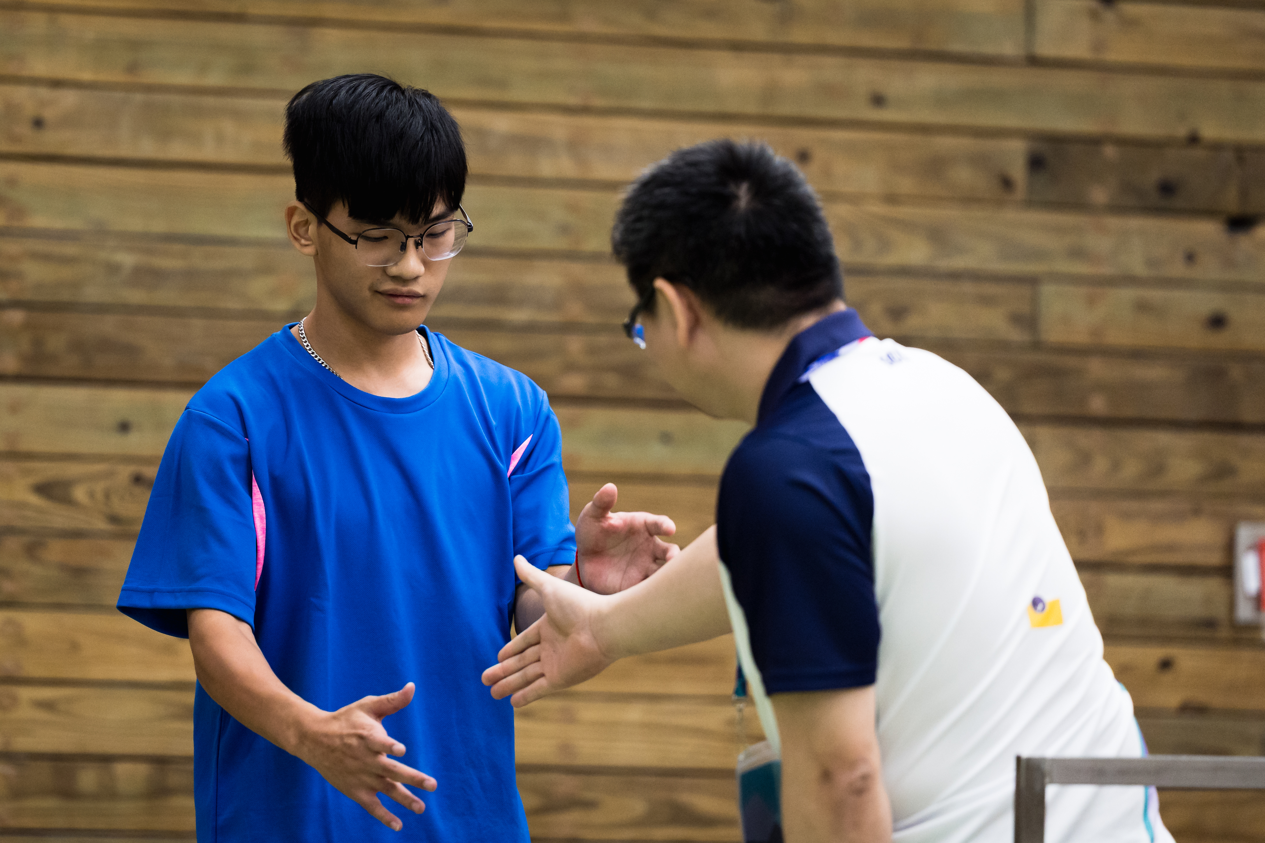 （左起）紀芳志、林威佑惺惺相惜