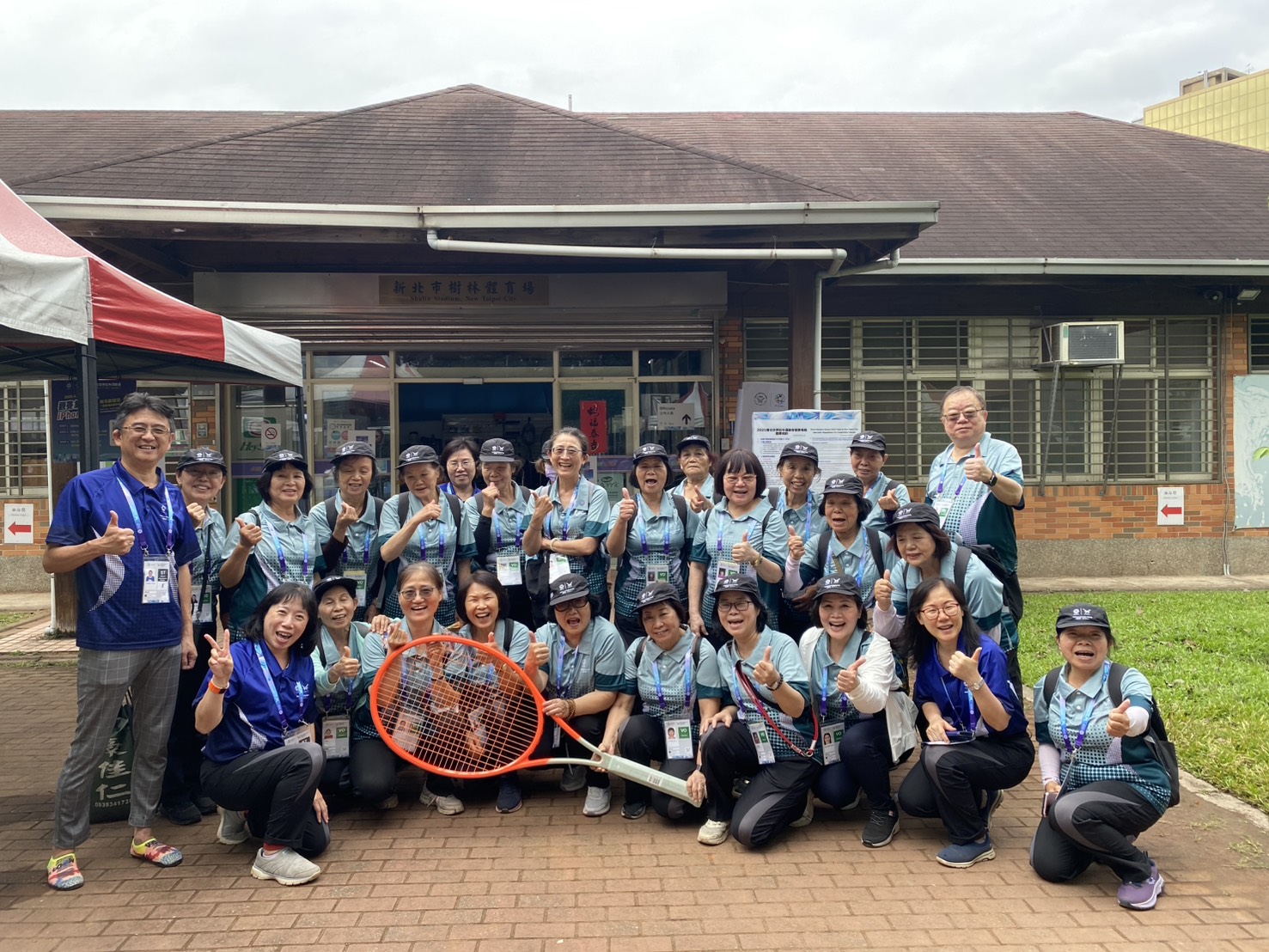 在紅土網球中心服務的志工團隊,在烈陽與雨水過後,都感覺能參與國際賽事,與有榮焉